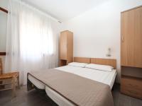 Łóżko lub łóżka w pokoju w obiekcie Apartment Casa Debora-1 by Interhome