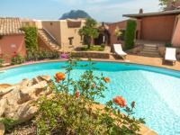 The swimming pool at or close to Holiday Home Dalia 20 - Vista Village by Interhome