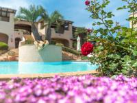 The swimming pool at or close to Holiday Home Dalia 20 - Vista Village by Interhome