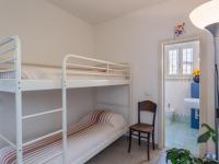 Łóżko lub łóżka w pokoju w obiekcie Villa Anita by Interhome