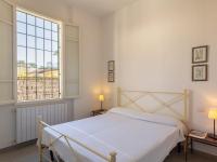 Łóżko lub łóżka w pokoju w obiekcie Villa Anita by Interhome