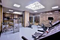 a gym with treadmills and ellipticals in a room at Grand Hotel Gulsoy Old City in Istanbul