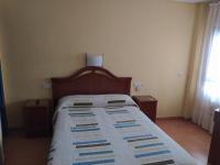 Posteľ alebo postele v izbe v ubytovaní Hostal Guzman El Bueno by gaiarooms