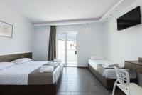 Posteľ alebo postele v izbe v ubytovaní Kahlua Boutique Hotel