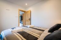 Posteľ alebo postele v izbe v ubytovaní Biały Miś Apartamenty Art & Design