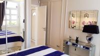 Posteľ alebo postele v izbe v ubytovaní Apartament Malibu Blue
