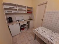 Kuchnia lub aneks kuchenny w obiekcie Gyopár Gyöngye Apartmanház