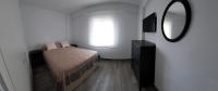 A bed or beds in a room at Apartamento Calpe - La Fossa - Peñon Ifach