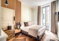 Posteľ alebo postele v izbe v ubytovaní DBH – Boutique Hotel Lake Como