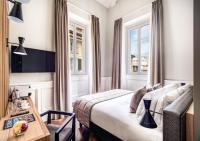 Posteľ alebo postele v izbe v ubytovaní DBH – Boutique Hotel Lake Como
