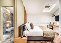 Posteľ alebo postele v izbe v ubytovaní DBH – Boutique Hotel Lake Como