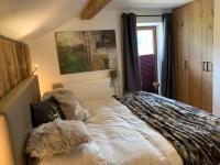 Posteľ alebo postele v izbe v ubytovaní Chalet Apart Hansler