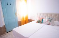 Postel nebo postele na pokoji v ubytování Salitre Rooms