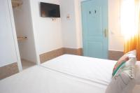 Postel nebo postele na pokoji v ubytování Salitre Rooms