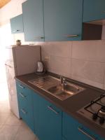 Kuchyň nebo kuchyňský kout v ubytování Apartment Ante K A1