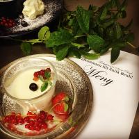 a plate of food with a dessert on a table at Snöå Bruk Hotell och konferens in Dala-Järna
