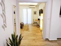 Televízia a/alebo spoločenská miestnosť v ubytovaní The Countess Riencourt Apartment