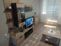Telewizja i/lub zestaw kina domowego w obiekcie Krénusz Vendégház 2.