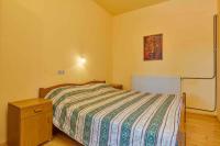 Posteľ alebo postele v izbe v ubytovaní Apartment Banjole 2