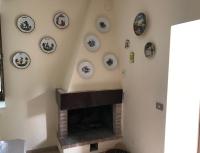 A television and/or entertainment centre at Val Giardino Vintage Cottage