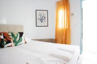 Postel nebo postele na pokoji v ubytování Salitre Rooms