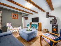 Televízia a/alebo spoločenská miestnosť v ubytovaní Holiday home Dane 22 Ucka
