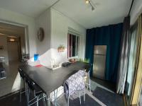 a kitchen with a table and chairs in a room at Boost Your Immo Six Fours Les Plages Pinèdes Aryana 477 in Six-Fours-les-Plages