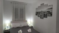 Postel nebo postele na pokoji v ubytování Urban Apartment Vukić