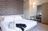 Posteľ alebo postele v izbe v ubytovaní Hotel Zenit