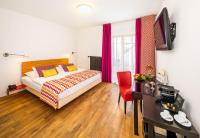 Postel nebo postele na pokoji v ubytování Bellevue Hotel Benešov