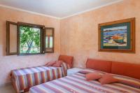 A bed or beds in a room at A charming country cottage + bikes and kayaks