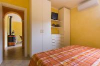 A bed or beds in a room at A charming country cottage + bikes and kayaks