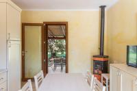 A television and/or entertainment centre at A charming country cottage + bikes and kayaks