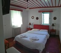 Posteľ alebo postele v izbe v ubytovaní Guesthouse Iro