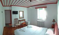 Posteľ alebo postele v izbe v ubytovaní Guesthouse Iro