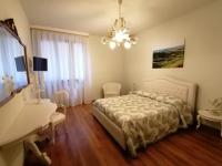 A bed or beds in a room at Dimora al Bosco