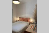 A bed or beds in a room at Casa tranquilla a pochissimi passi dal mare