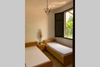A bed or beds in a room at Casa tranquilla a pochissimi passi dal mare