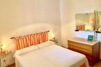 A bed or beds in a room at Casa tranquilla a pochissimi passi dal mare