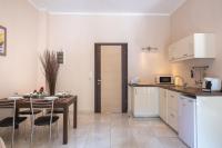 A kitchen or kitchenette at Galini Beach Studios and Penthouse