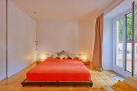Posteľ alebo postele v izbe v ubytovaní Casa de Pueblo junto Barcelona Centro