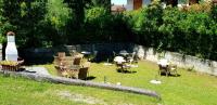 A garden outside Hotel Aurora Duino