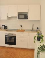 A kitchen or kitchenette at Verdi appartment