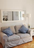 A seating area at Verdi appartment