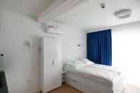 Posteľ alebo postele v izbe v ubytovaní Blue Sky Apartments Rezydencja Niechorze - 302