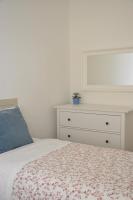 A bed or beds in a room at Verdi appartment
