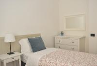A bed or beds in a room at Verdi appartment