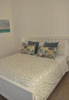 A bed or beds in a room at Verdi appartment