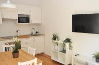 A kitchen or kitchenette at Verdi appartment