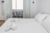 Posteľ alebo postele v izbe v ubytovaní Cozy Casa